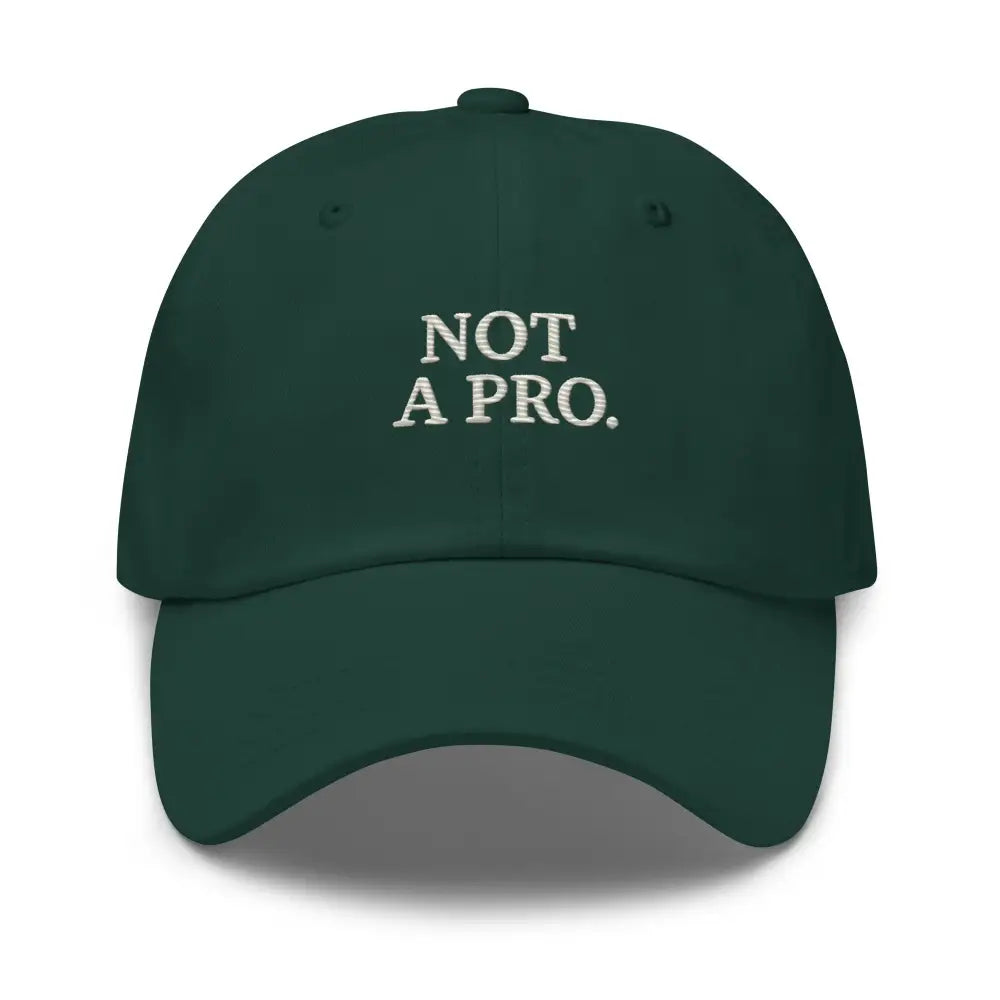 Dark green minimalist dad hat with white embroidered text