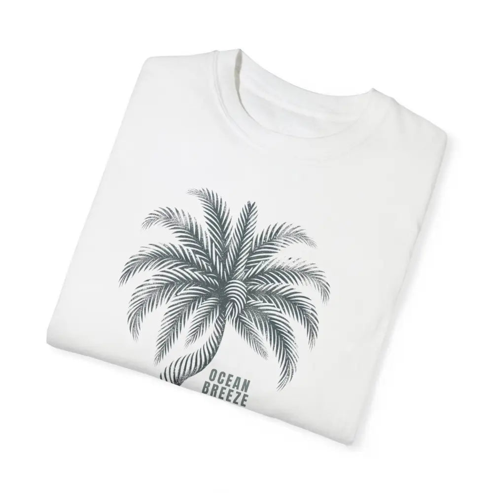 Folded white ring-spun cotton t-shirt with gray palm tree graphic