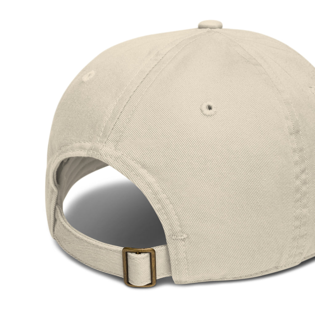 Heritage Bison Organic Cotton Hat product detail showing OCS certified organic cotton fabric texture and embroidered bison emblem — Trini Skies