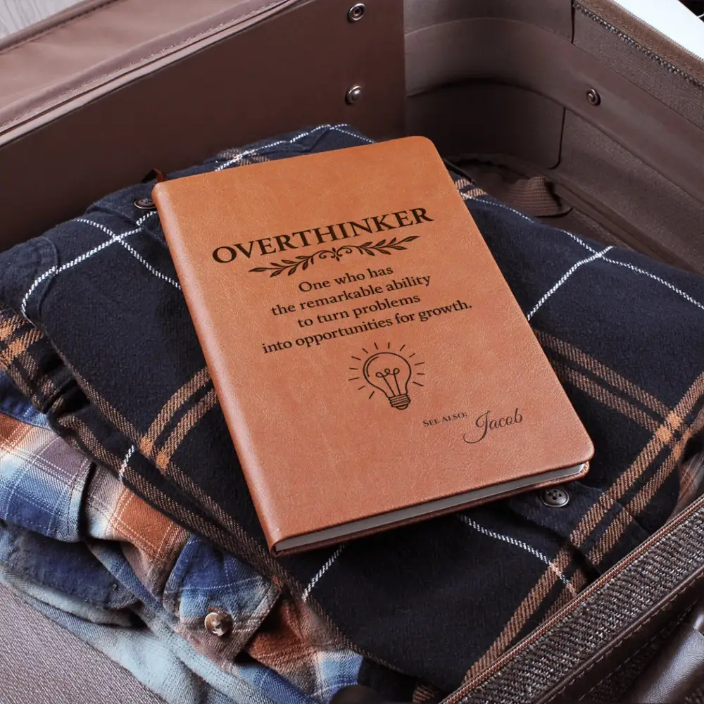 Brown leather overthinker journal with lightbulb graphic