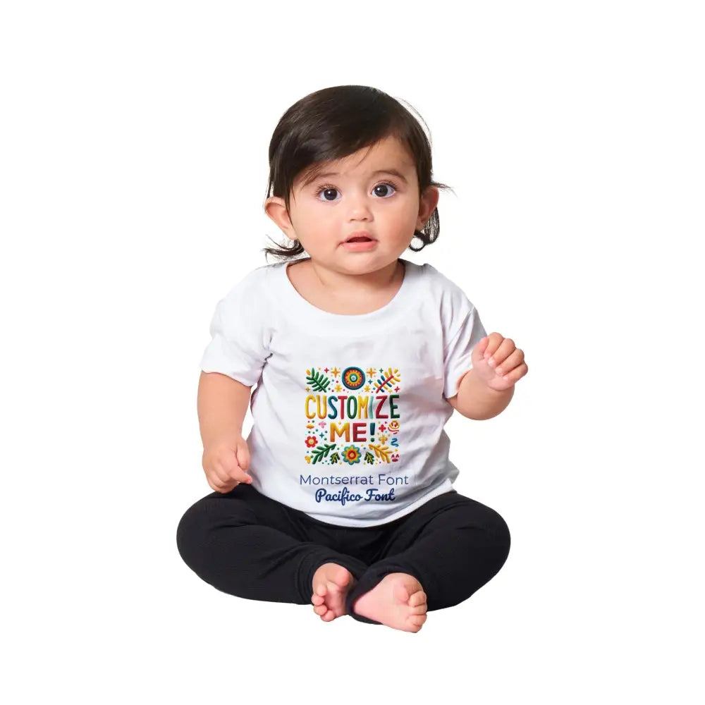 Baby in white tee and black pants from Trini Skies customize tee