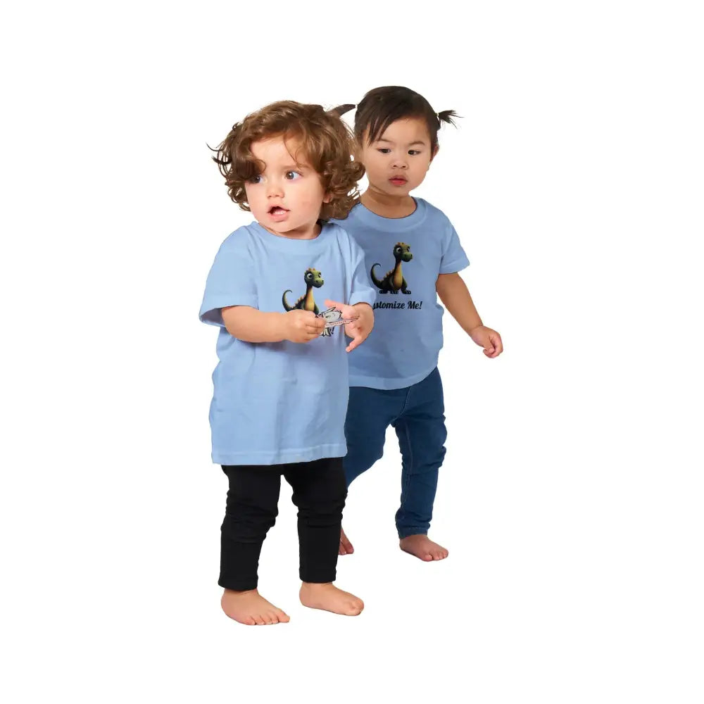 Two toddlers in favorite dinosaur graphic tees and pants