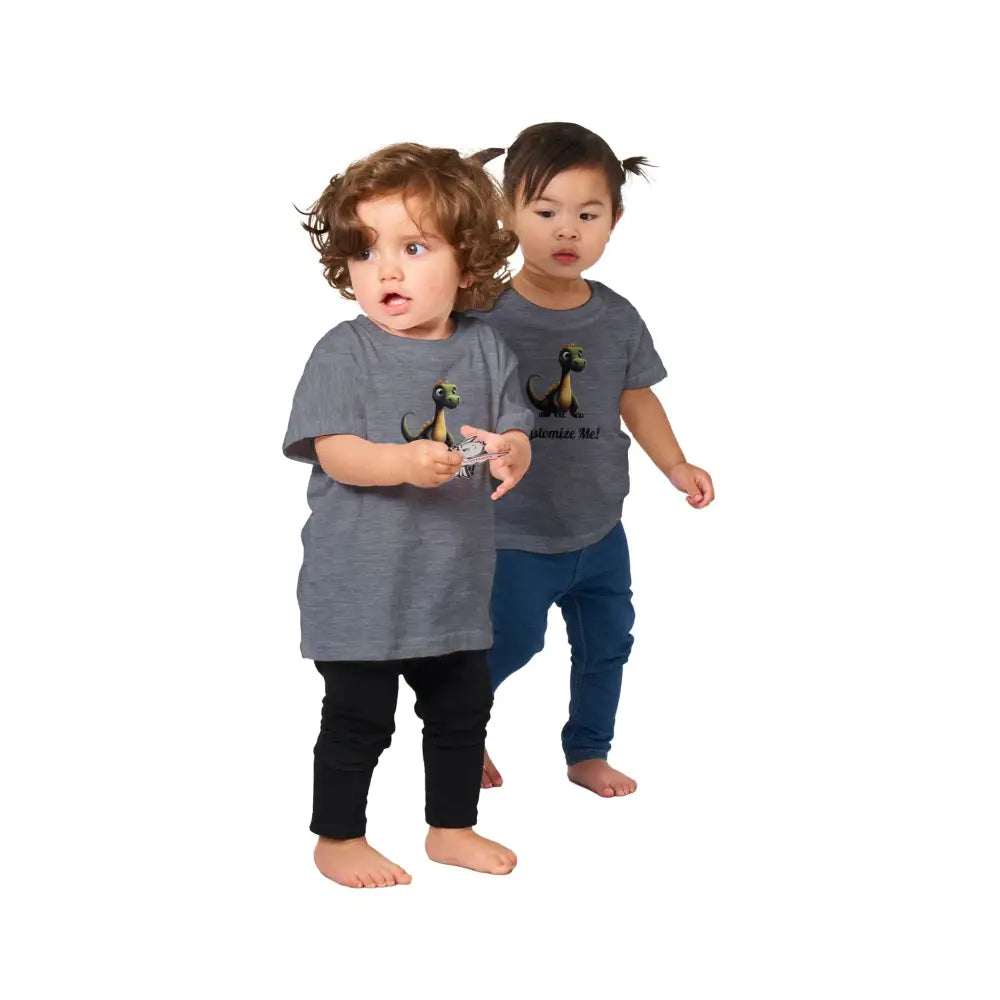 Two toddlers in matching favorite dinosaur graphic tees and pants