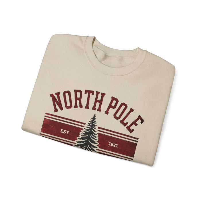 Printify Sweatshirt Sand / S North Pole University Graphic Varsity Merry Christmas Sweatshirt Heavy Blend Crewneck