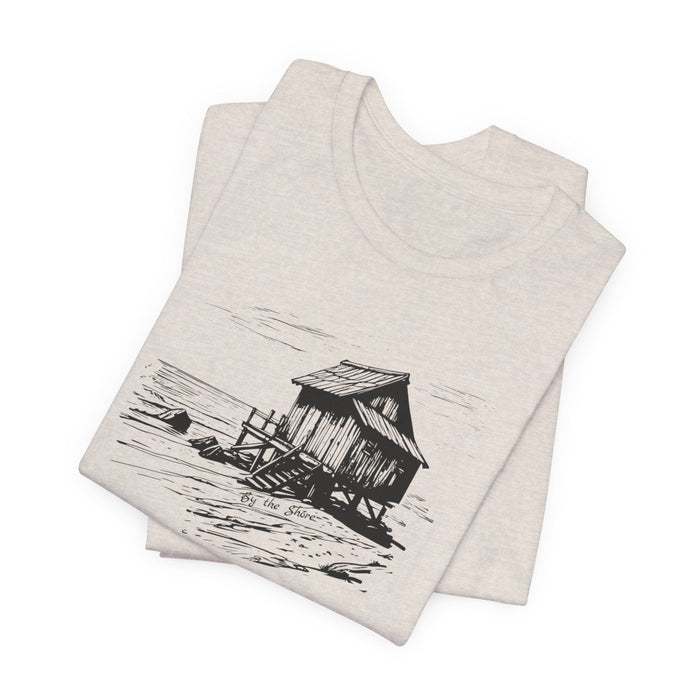 Printify T-Shirt Heather Dust / XS By the Shore Cabin Tee Tranquil Waterfront Design Tshirt