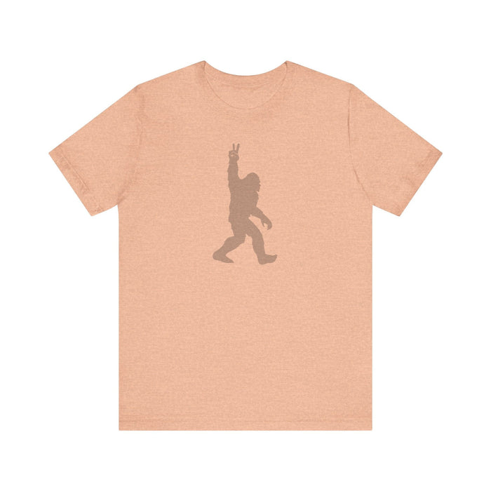 Printify T-Shirt Heather Peach / S Bigfoot on the Loose Tee: Unleash Your Inner Adventurer! Mens Gift, Mountain Tshirt, Camping Adventure, Womens Gift