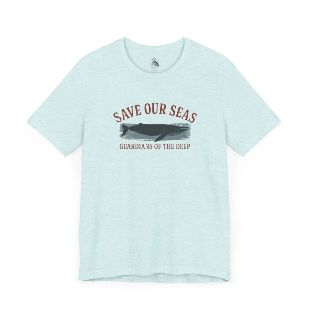 Light blue Trini Skies whale graphic tee with classic crew neckline