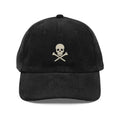 Trini Skies embroidered corduroy dad hat with skull and cross golf tees logo