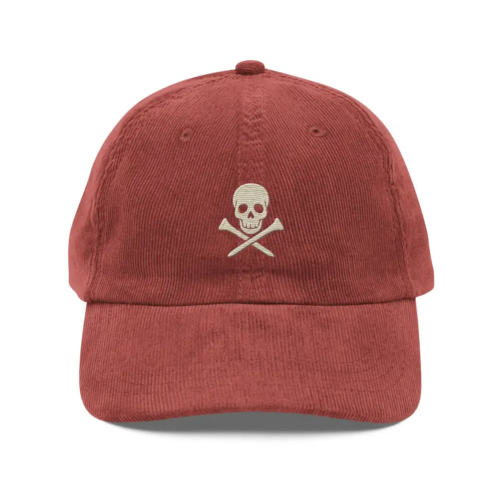 Trini Skies embroidered corduroy dad hat in rust with skull design