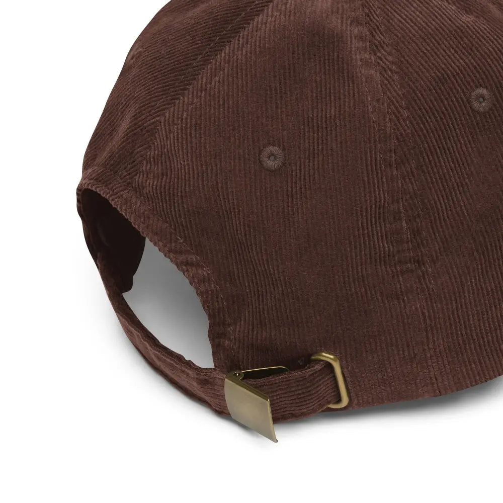 Vintage corduroy cap with enter embroidered trini skies design