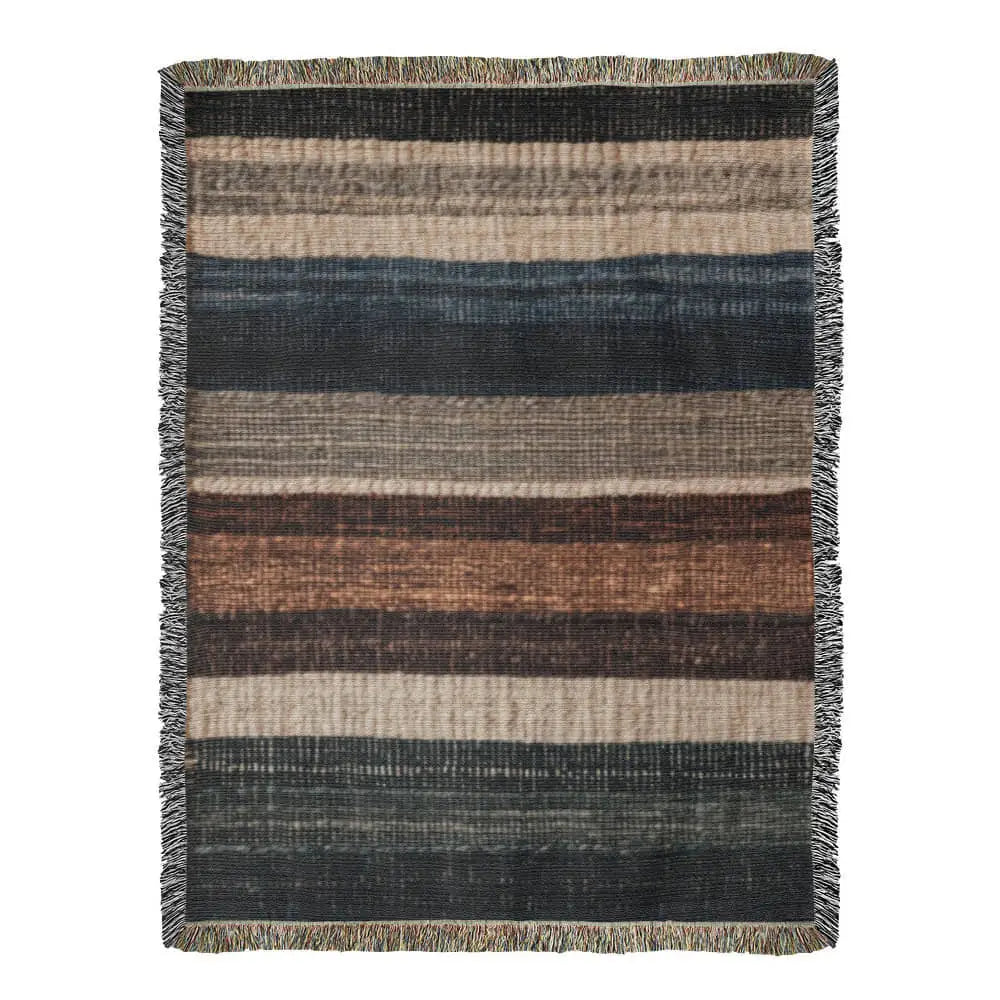 Striped woven blanket in neutral lodge-inspired cotton tapestry with earthy stripes