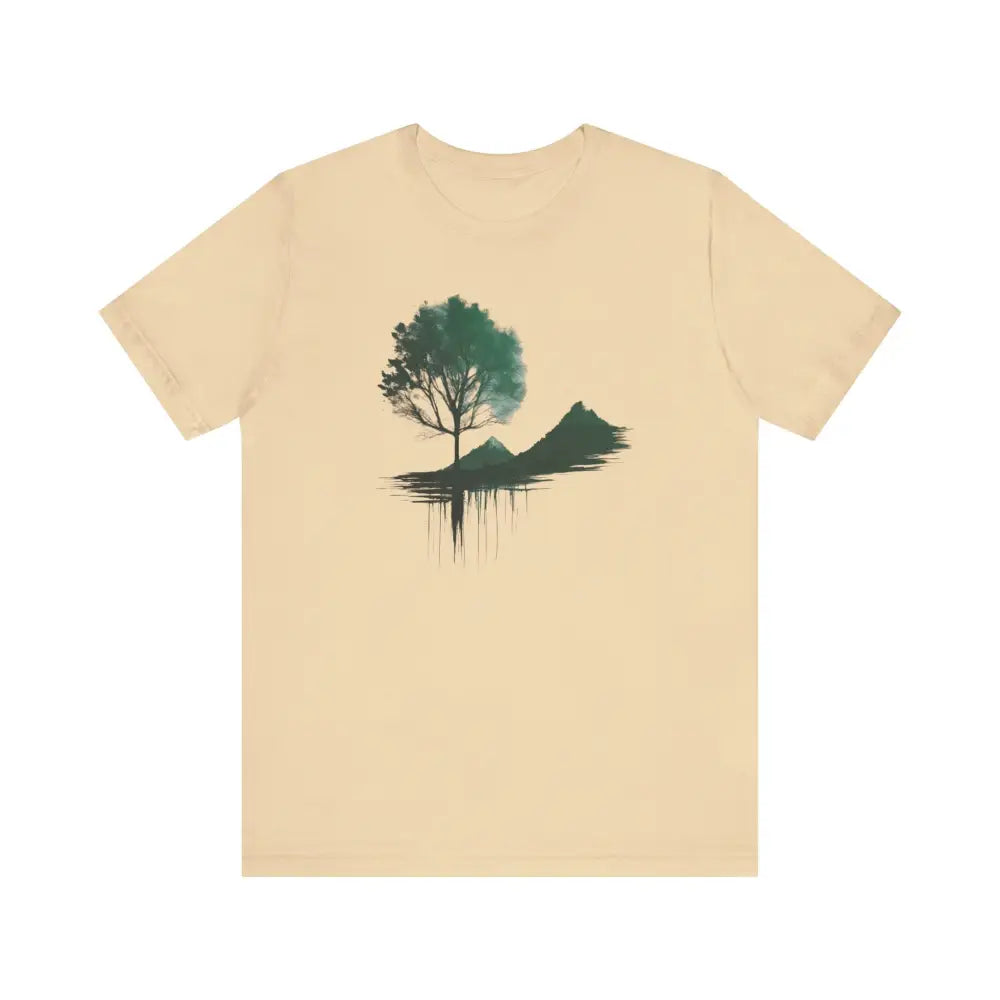 Light beige unisex tee with green tree mountain graphic for hiking