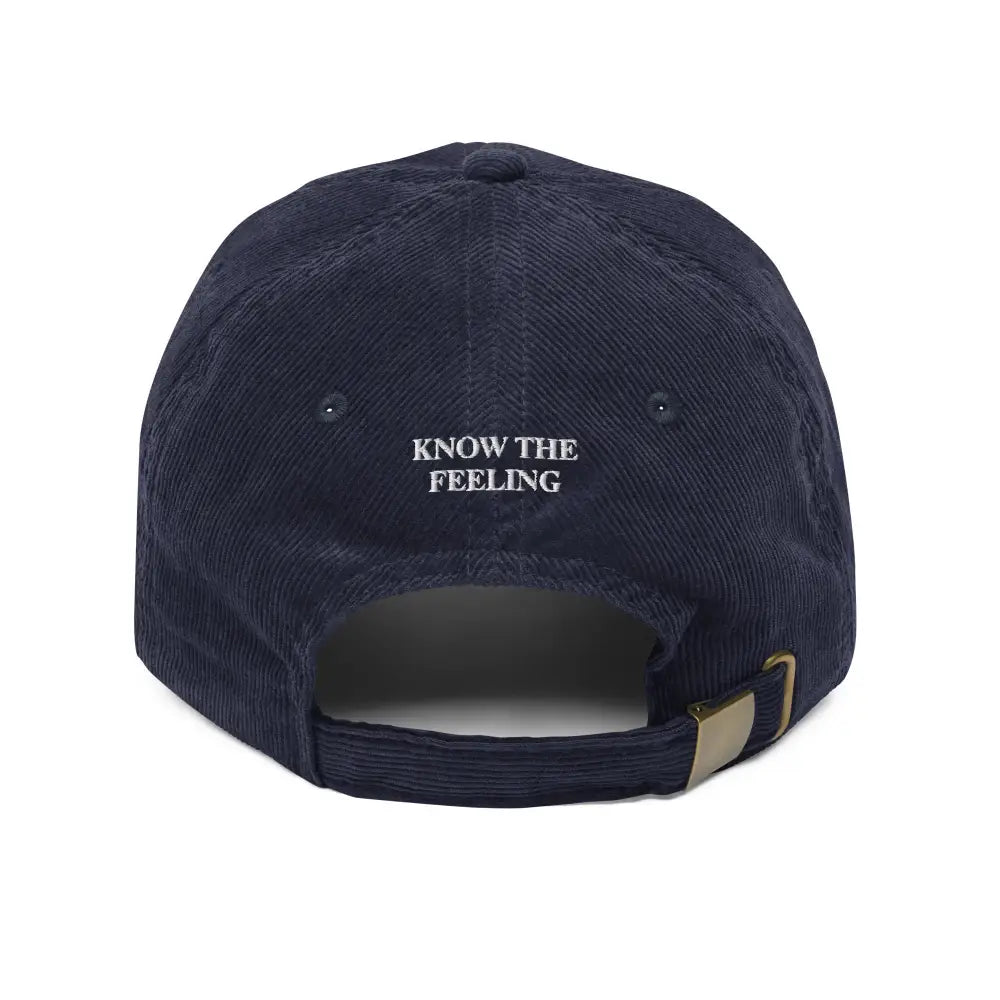 Trini Skies embroidered corduroy cap with captain hat design in dark blue