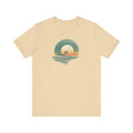 Light beige tropical oasis paradise sunset graphic tee in airlume combed cotton