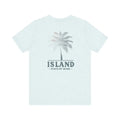 White Island State of Mind tee with palm tree graphic under Trini skies