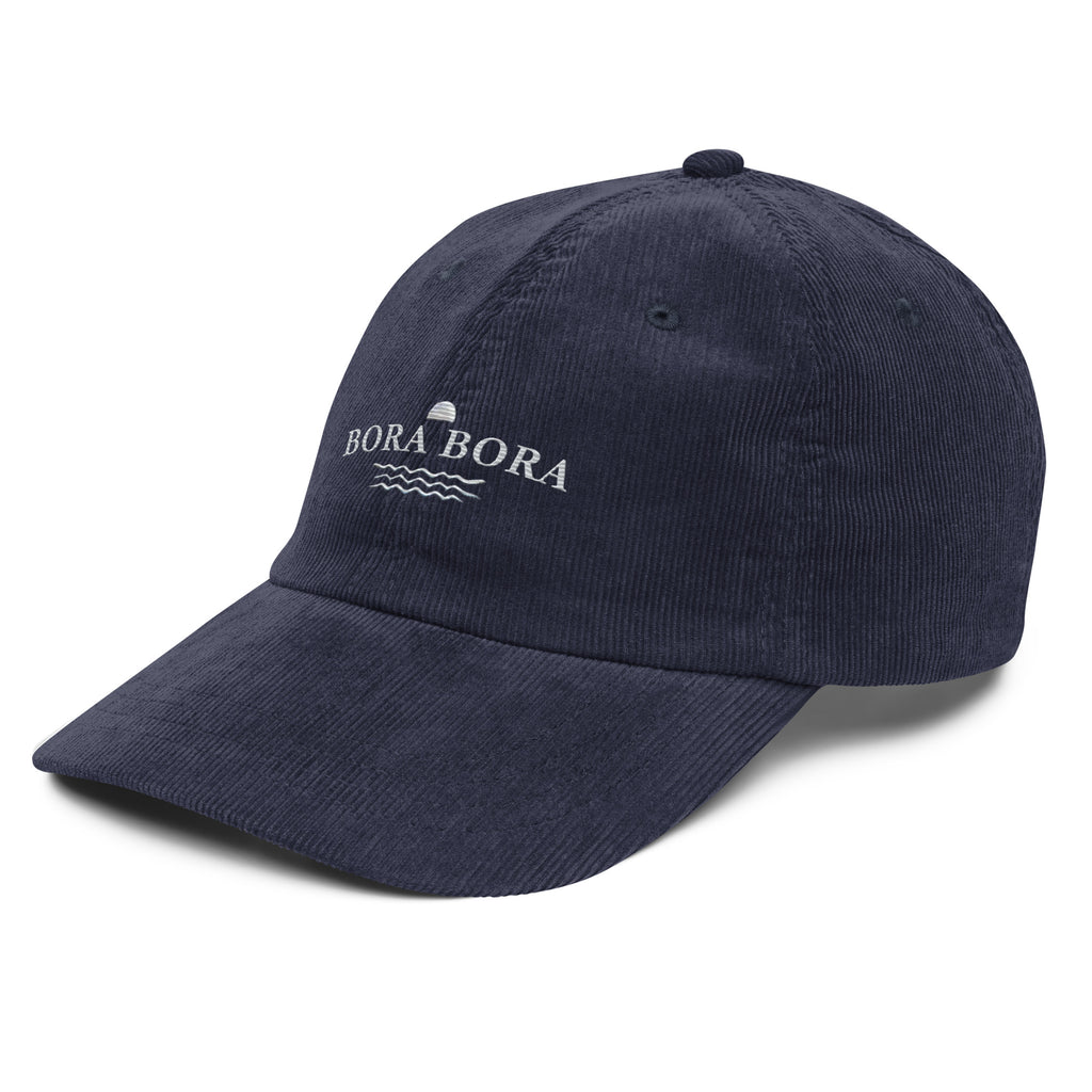 Navy corduroy Bora Bora embroidered cap with minimalist white coastal embroidery and relaxed vintage resort aesthetic