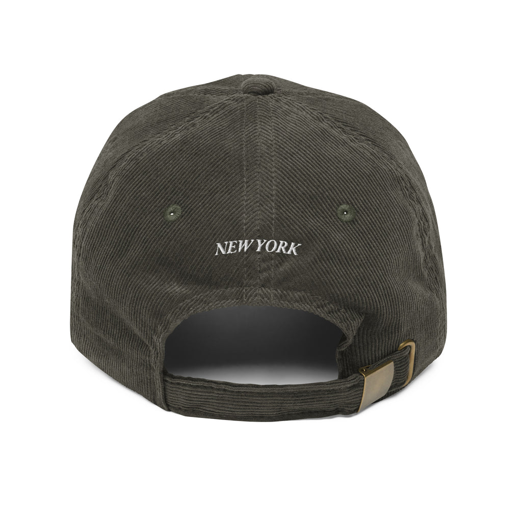 New York Carriage corduroy hat brown back view New York text strap Trini Skies Destination Collection