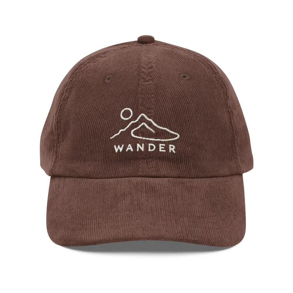 Brown embroidered corduroy cap with minimalist mountain sun design