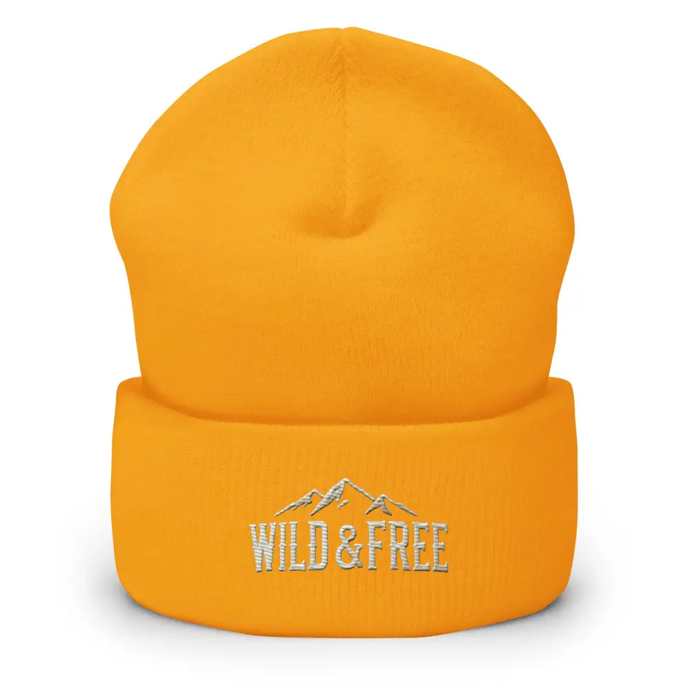 Mustard yellow cuffed beanie with embroidered mountain and Wild & Free design
