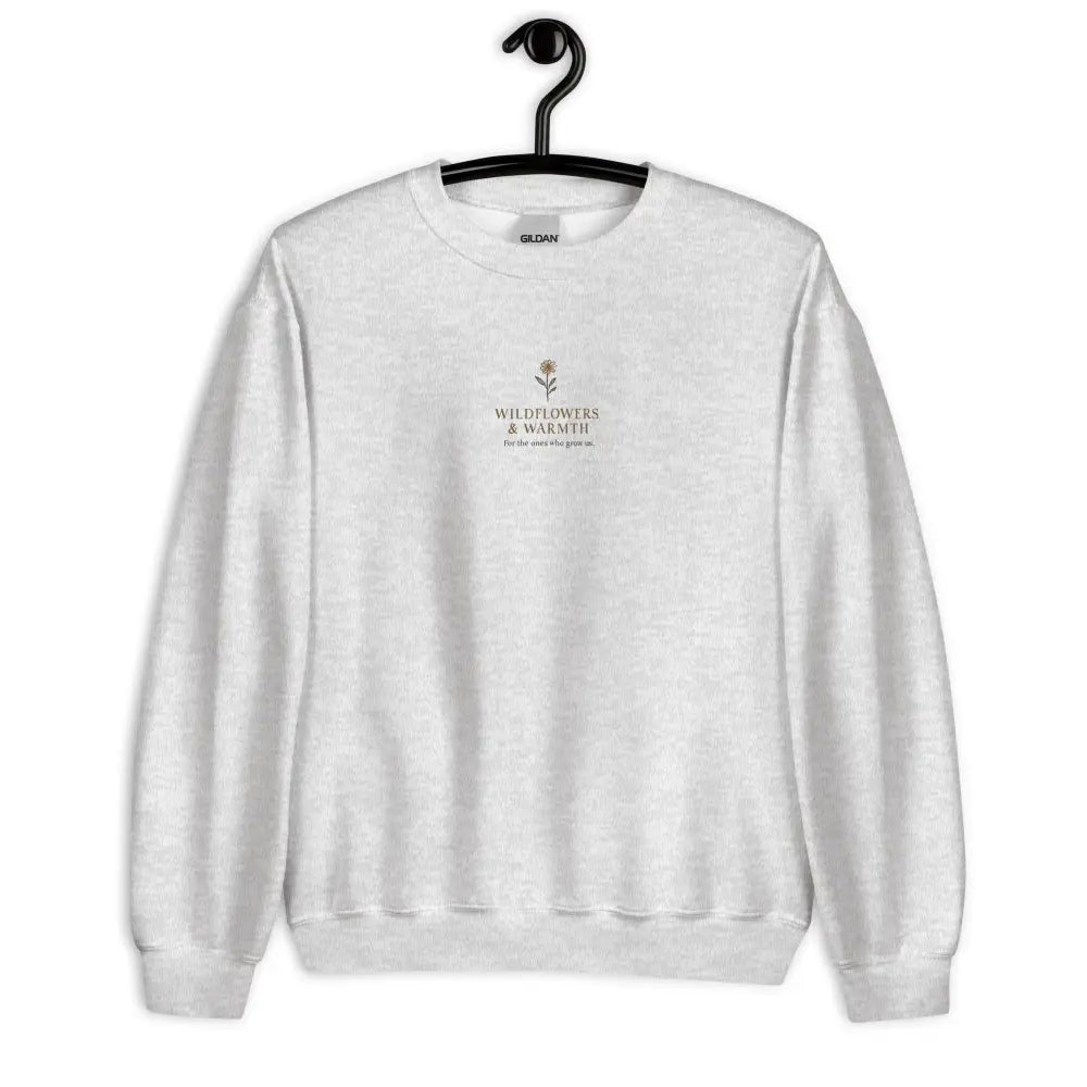 Light gray crewneck with wildflower bloom embroidered on chest