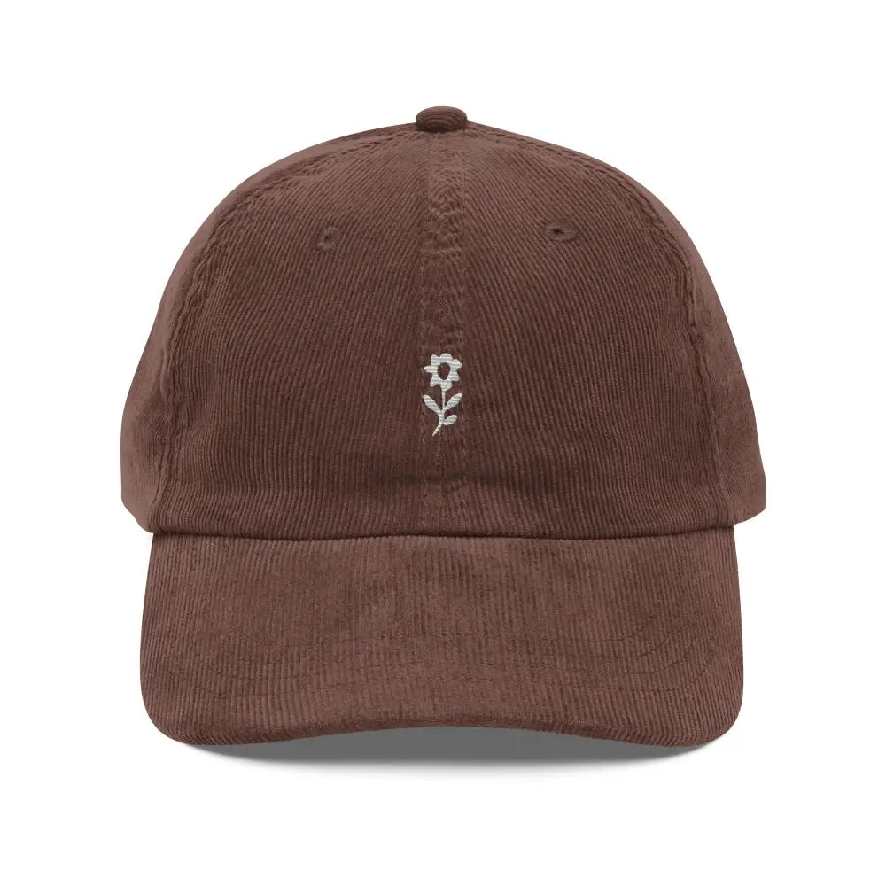 Brown corduroy baseball cap with white embroidered wildflower by Trini Skies Supply