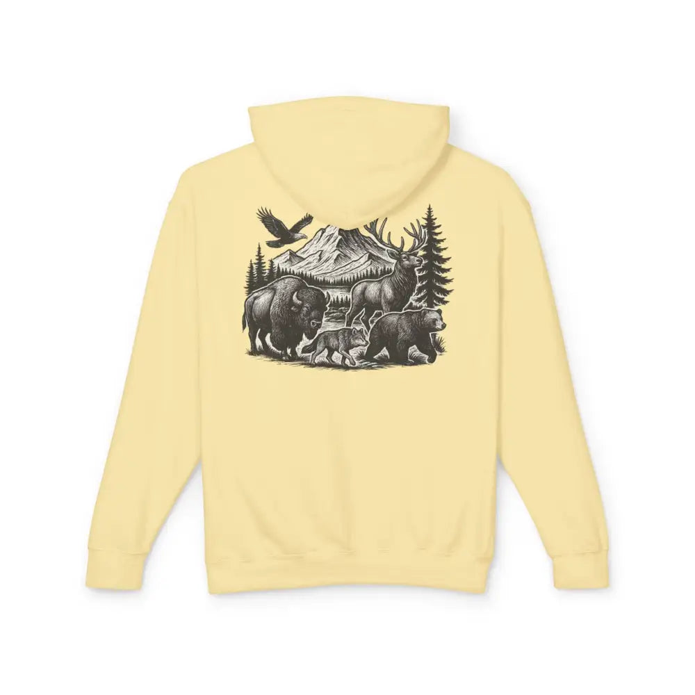 Pale yellow Trini Skies wildlife mountain scene hoodie with bison graphic