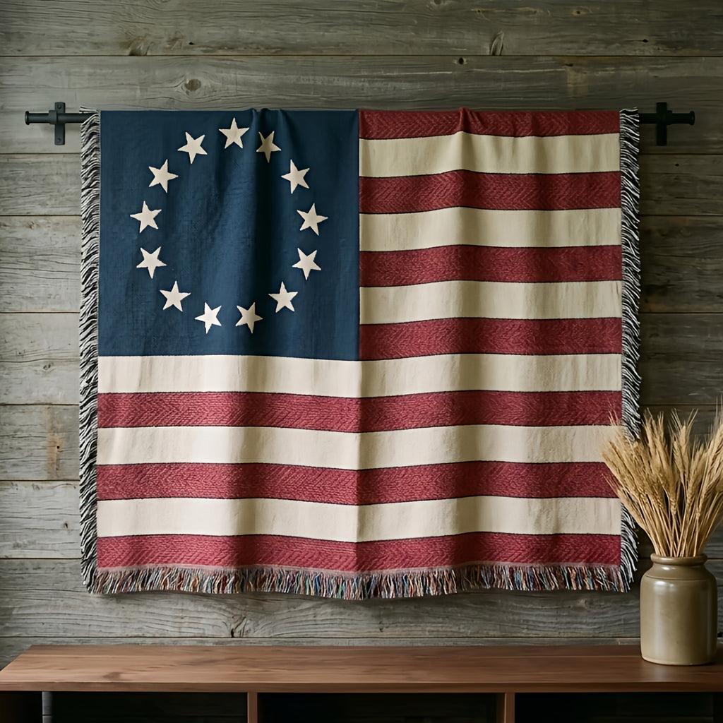 Betsy Ross 13-star flag woven cotton throw hung on a barnwood wall above a walnut console with dried wheat