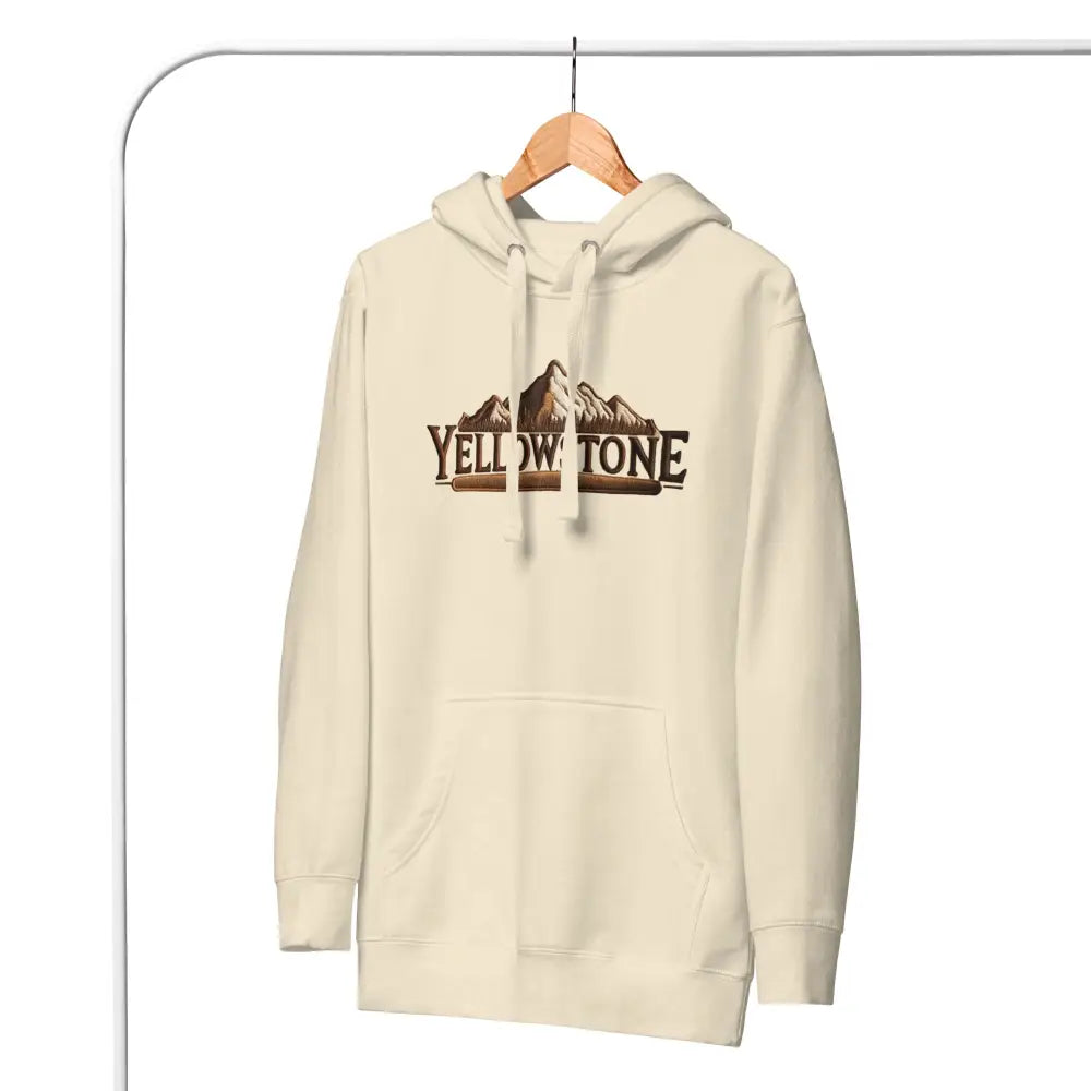 Cream-colored Yellowstone-inspired unisex hoodie with mountain graphic for hiking nature lovers